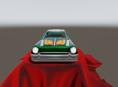 A toy car with clear-coated paint on a sheen cloth, orbiting